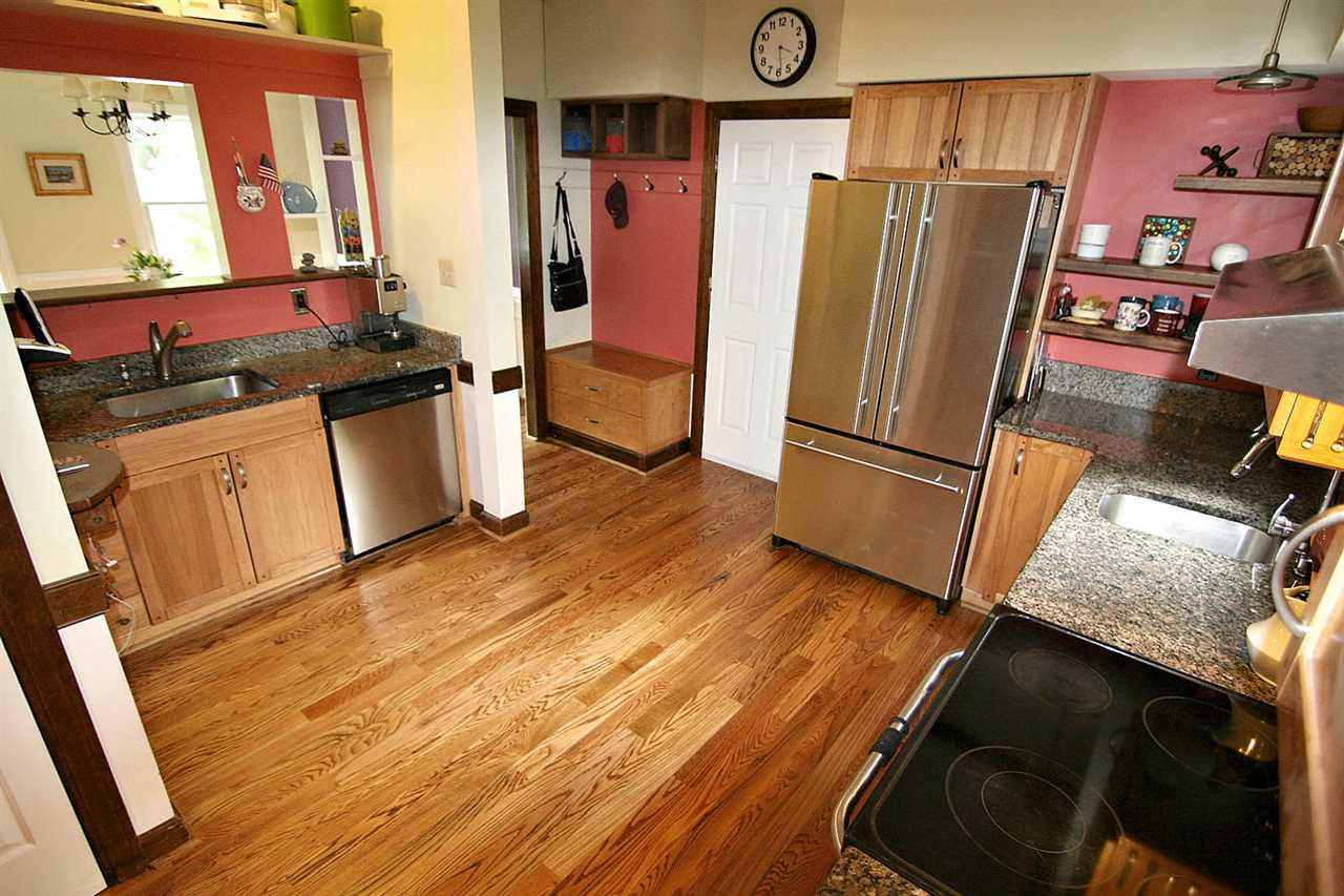 206 Lawrence Road Cary, NC 27511 - Photo 3 of 25 *Bright Open Kitchen w/ Updates*Granite Counters, Smooth-top Stove, Two Sinks (use one for prep and one for dishes), Nooks for Your Books, Large Pantry*