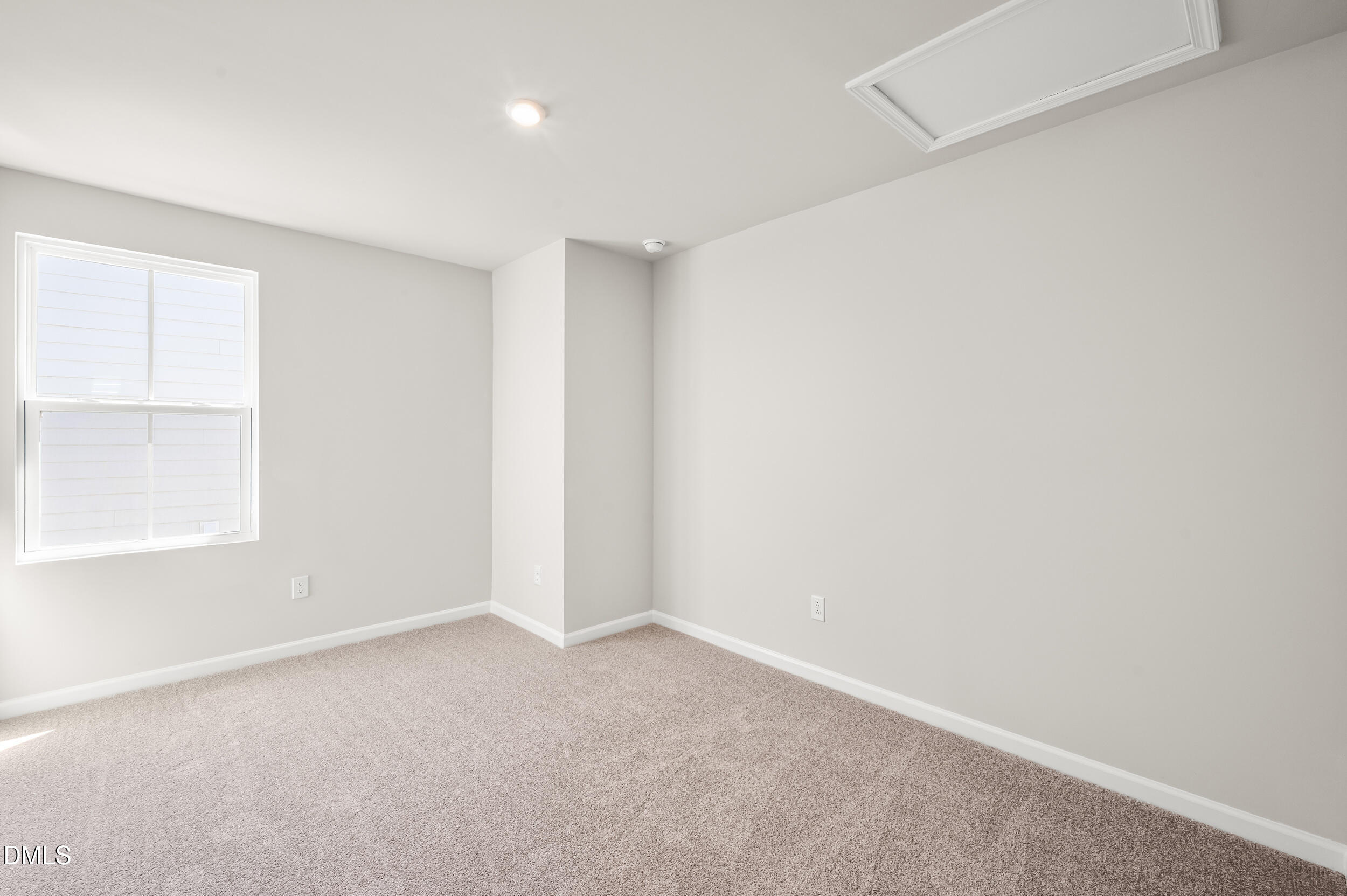 129 Cavalier Rider Run Wendell, NC 27591 - Photo 21 of 38 an empty room with a window