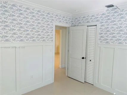 a view of a livingroom with wooden floor