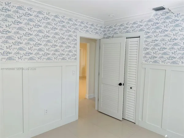 a view of a livingroom with wooden floor