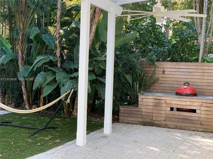 a view of a backyard with plants