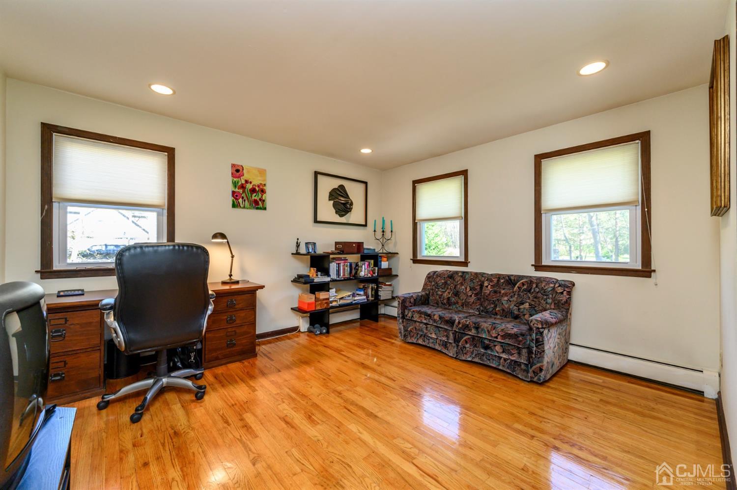 56 Valley View Road Warren, NJ 07059 - Photo 14 of 40 a living room with furniture and a window