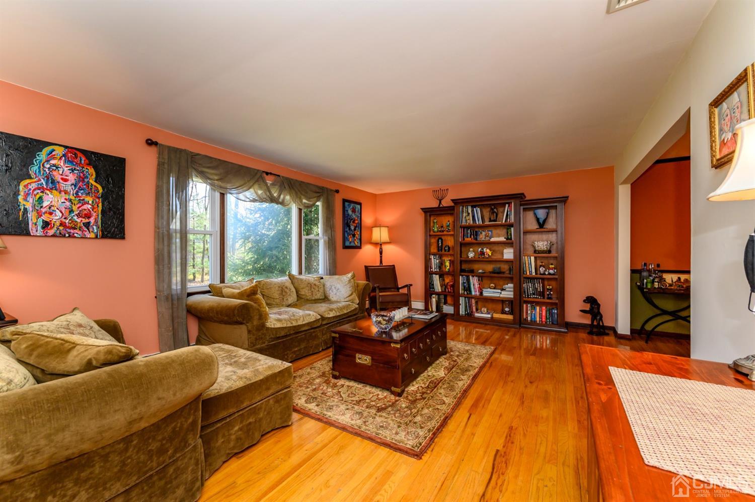 56 Valley View Road Warren, NJ 07059 - Photo 5 of 40 a living room with furniture a rug and a large window