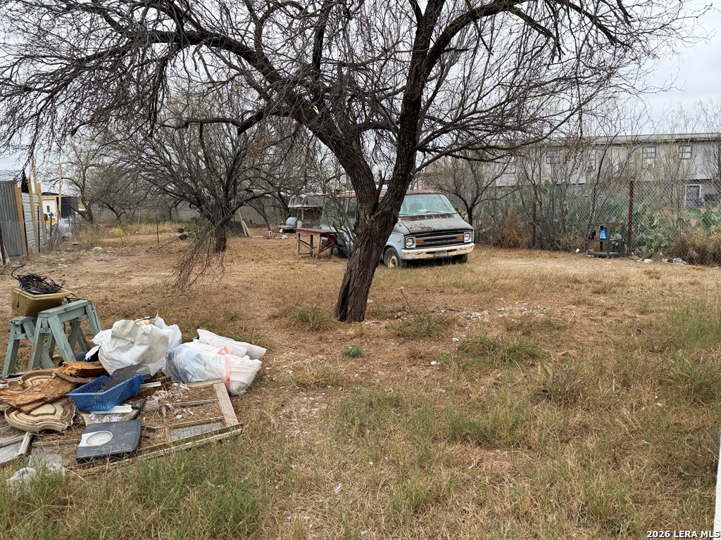 3148 Leonel Street Eagle Pass, TX 78852 - Photo 14 of 18 a view of a yard with furniture and a fire pit