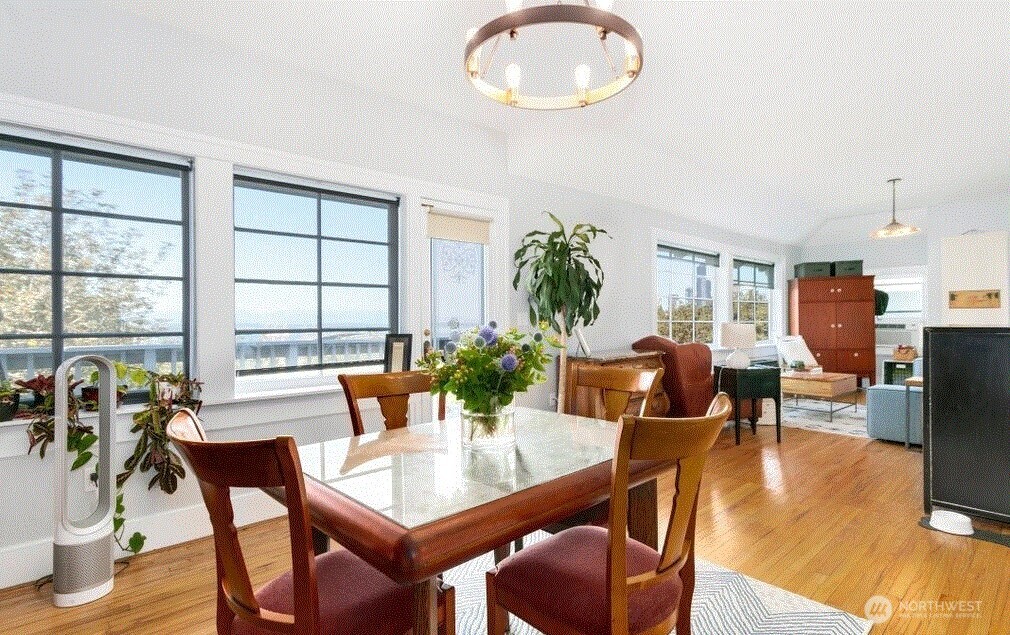 1745 12th Avenue South, Unit 1 4 Seattle, WA 98144 - Photo 20 of 39 a view of a dining room with furniture window and wooden floor