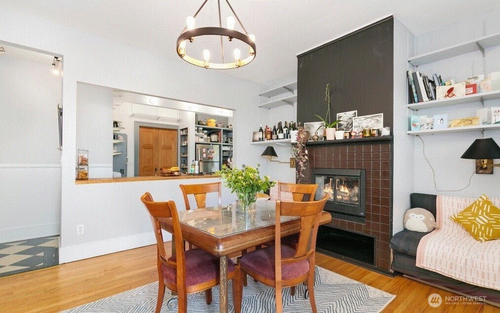 1745 12th Avenue South, Unit 1 4 Seattle, WA 98144 - Photo 21 of 39 a view of a dining room with furniture and wooden floor