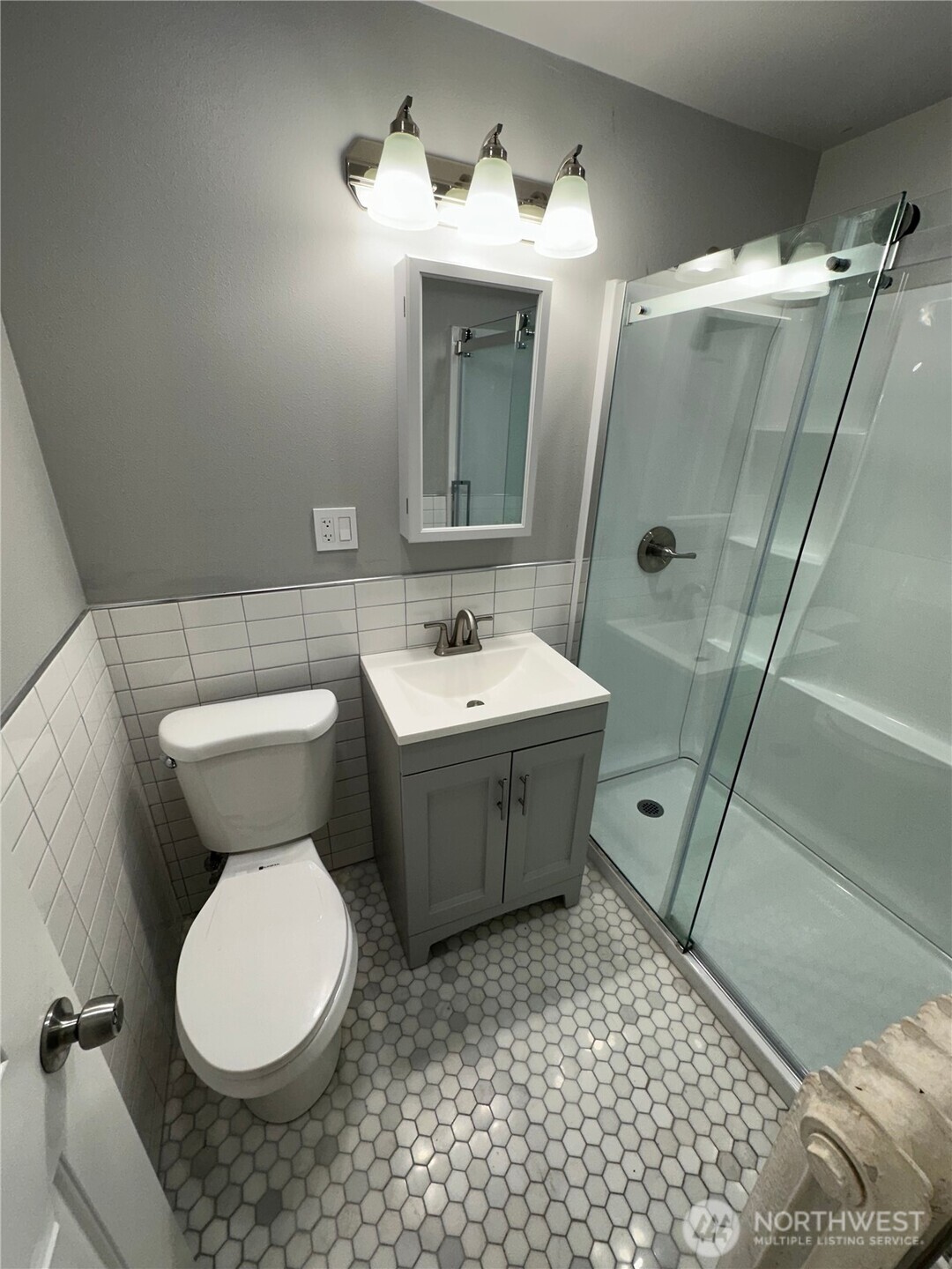 1745 12th Avenue South, Unit 1 4 Seattle, WA 98144 - Photo 32 of 39 a bathroom with a sink toilet and shower