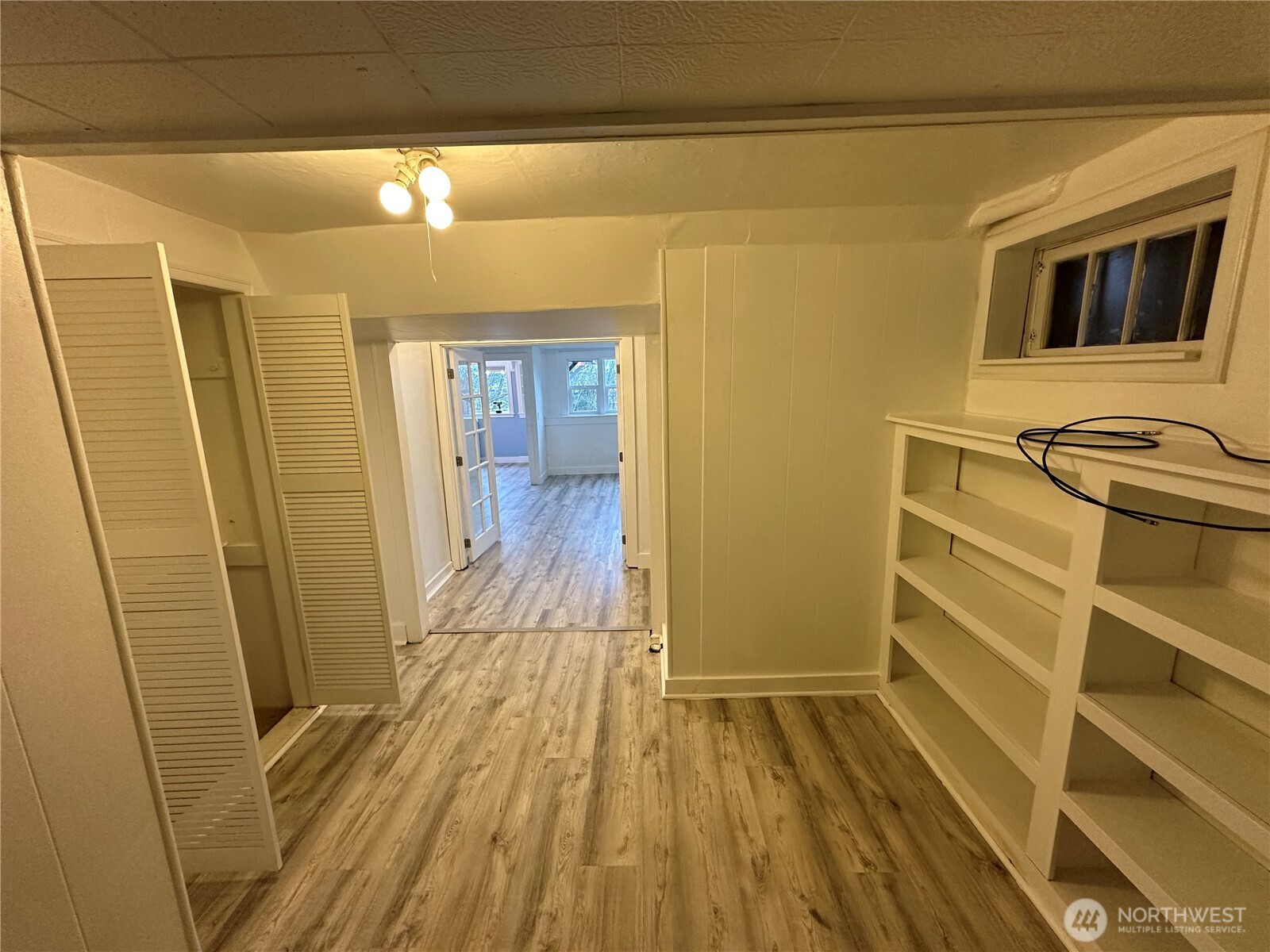 1745 12th Avenue South, Unit 1 4 Seattle, WA 98144 - Photo 34 of 39 a view of a hallway with wooden floor and staircase