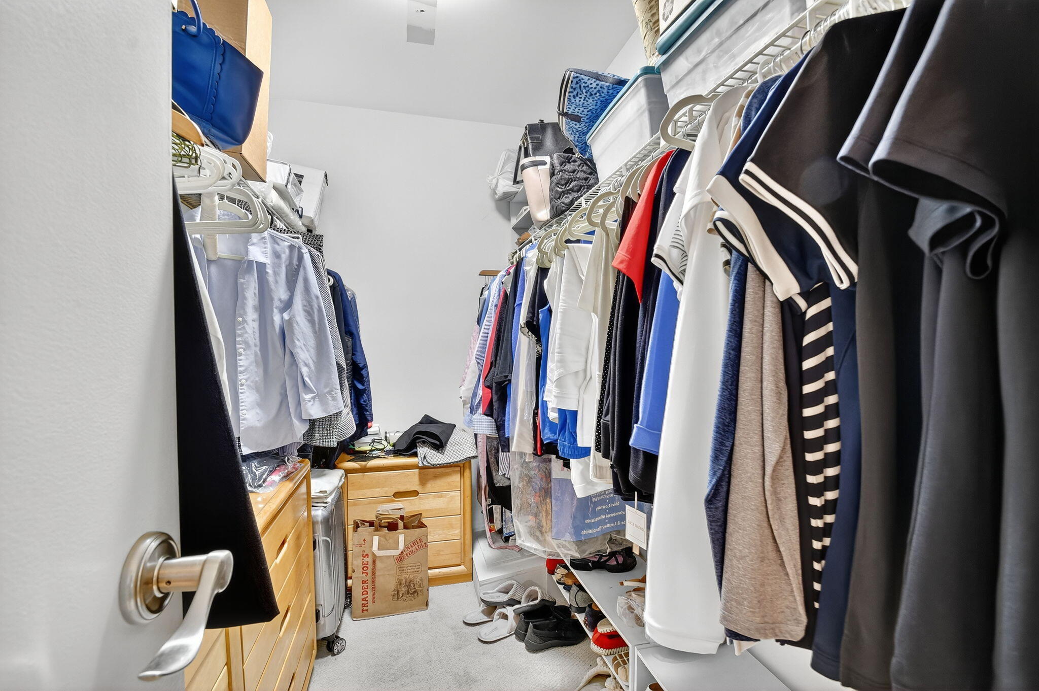 11854 Rene Lacoste Place Wellington, FL 33414 - Photo 27 of 45 a view of walk in closet with clothes