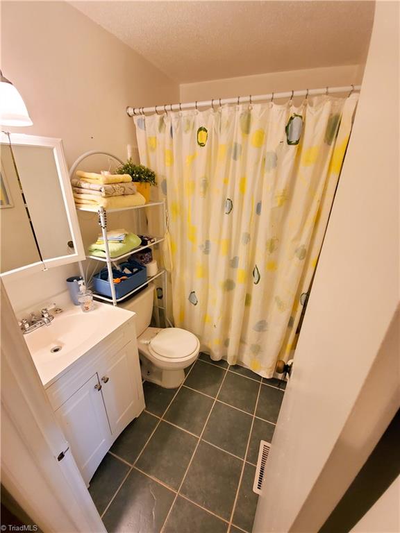 5711 Bramblegate Road, Unit M Greensboro, NC 27409 - Photo 15 of 15 Owners Bathroom