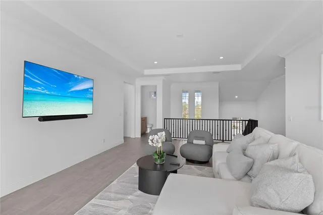a living room with furniture and window