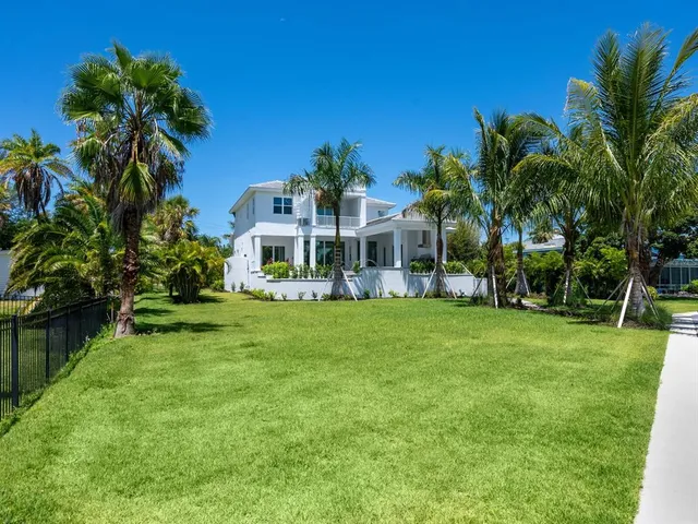 a view of a house with a big yard