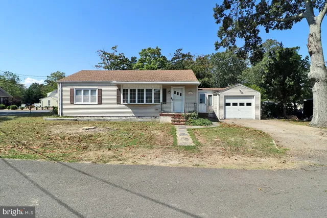 a house with trees in the background