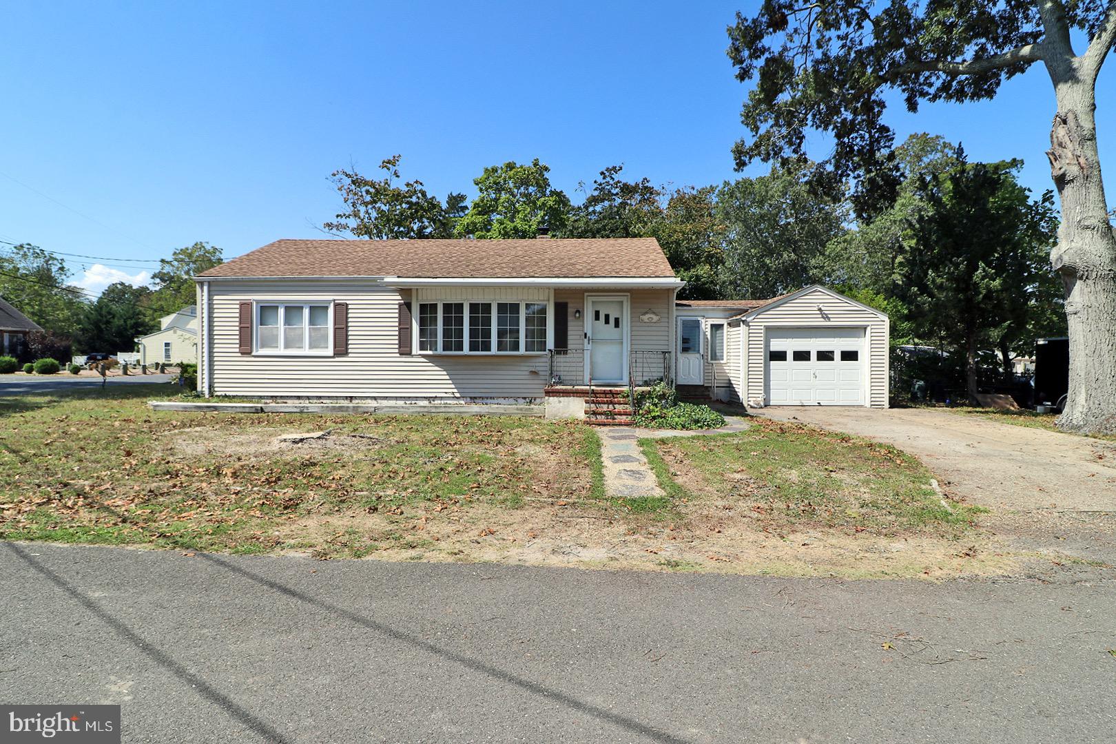 a house with trees in the background