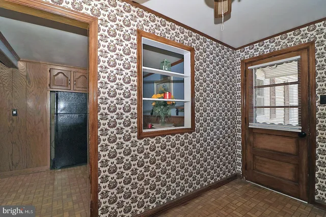 a bathroom with a sink a mirror and shower