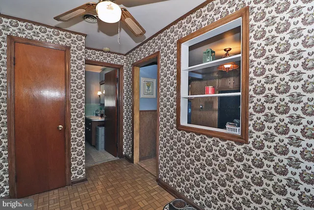 a view of a hallway with front door