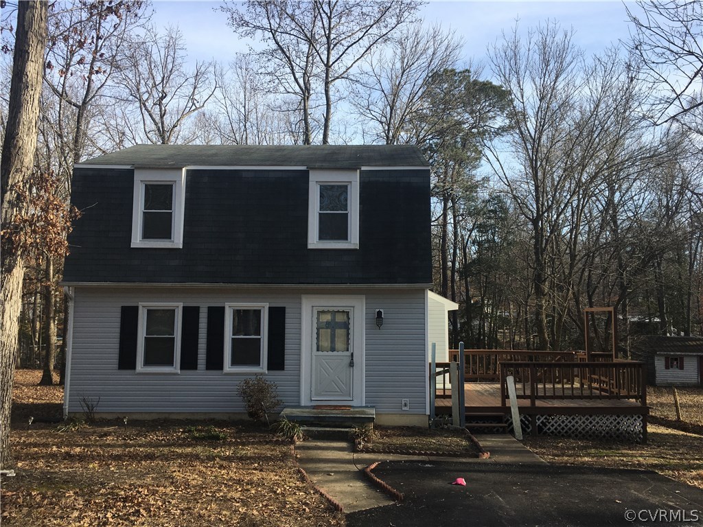 a front view of a house with yard