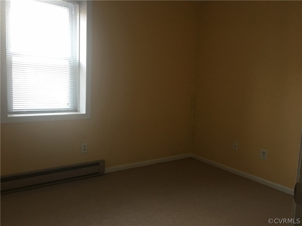5253 Rollingway Road Chesterfield, VA 23832 - Photo 14 of 16 an empty room with a window