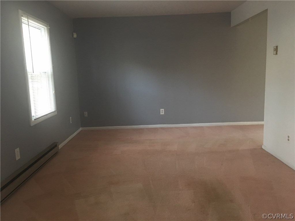 5253 Rollingway Road Chesterfield, VA 23832 - Photo 8 of 16 a view of an empty room with a window