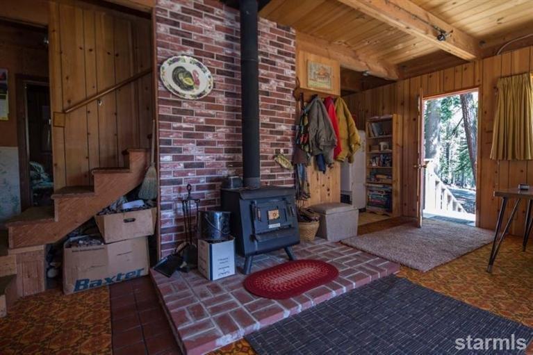 50600 Devils Gate Road, Unit 14 Kirkwood, CA 95646 - Photo 4 of 10 Wood burning fireplace in living/dining area.