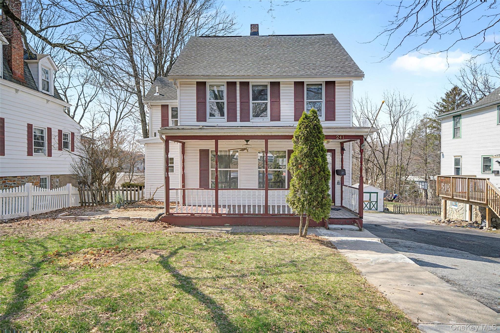 241 North Main Street, Unit 2 Monroe, NY 10950 - Photo 1 of 1 front view of a house with a yard