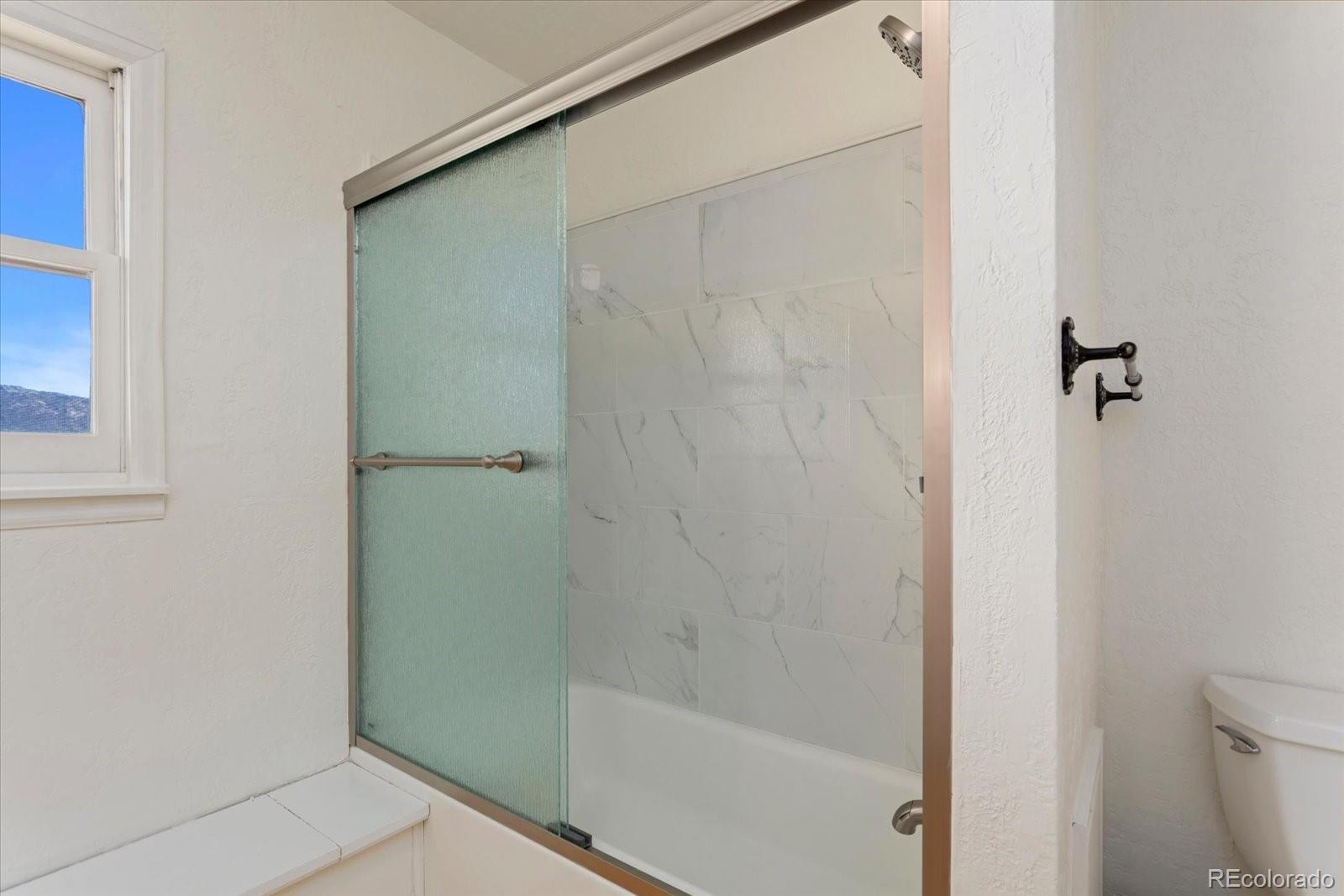 716 West Blarney Stone Road Howard, CO 81233 - Photo 26 of 50 a bathroom with a shower
