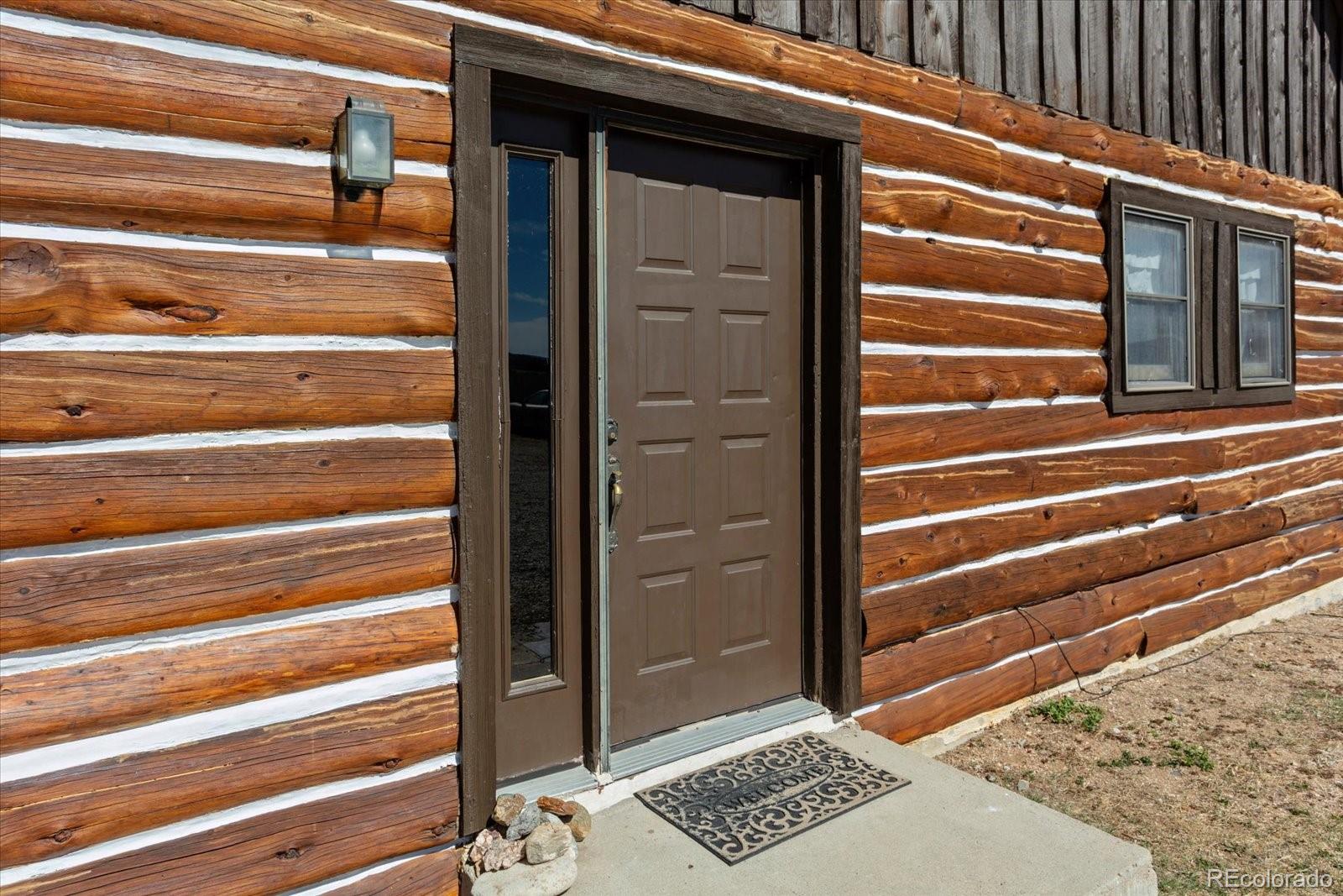716 West Blarney Stone Road Howard, CO 81233 - Photo 31 of 50 a view of entryway with wooden floor