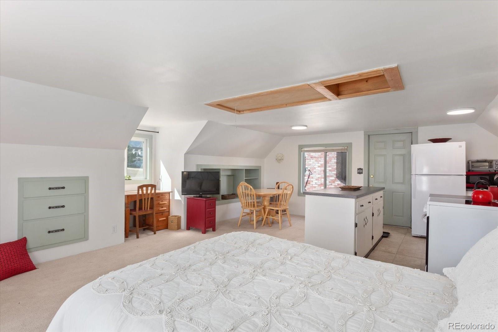 716 West Blarney Stone Road Howard, CO 81233 - Photo 48 of 50 a bedroom with a bed and furniture