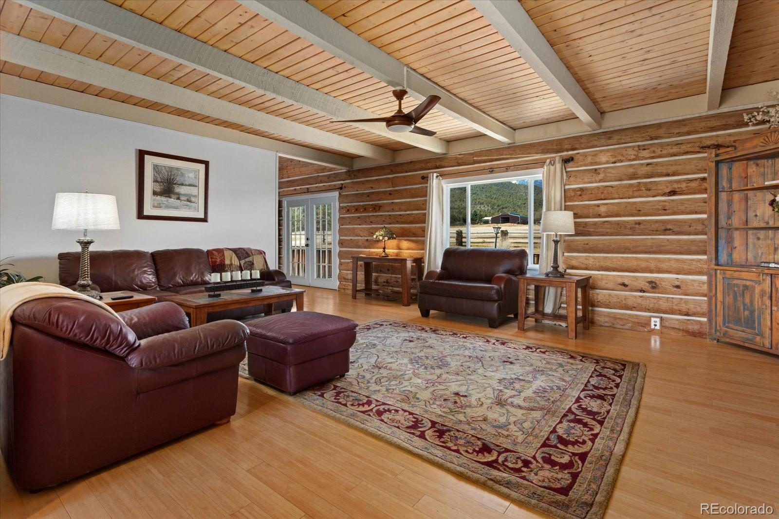 716 West Blarney Stone Road Howard, CO 81233 - Photo 8 of 50 a living room with furniture or couch and a wooden floor