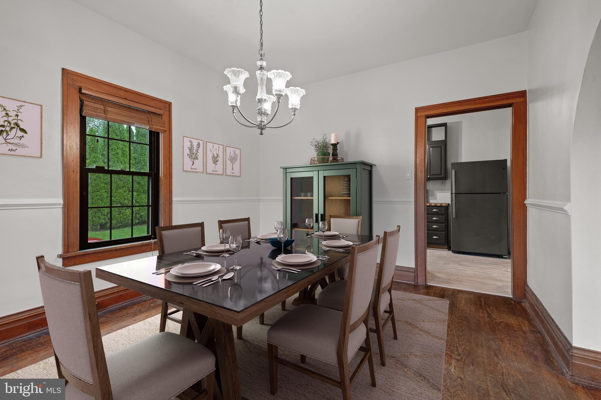 209 Ironstone Ridge Road Lancaster, PA 17603 - Photo 13 of 50 a view of a dining room with furniture window and wooden floor