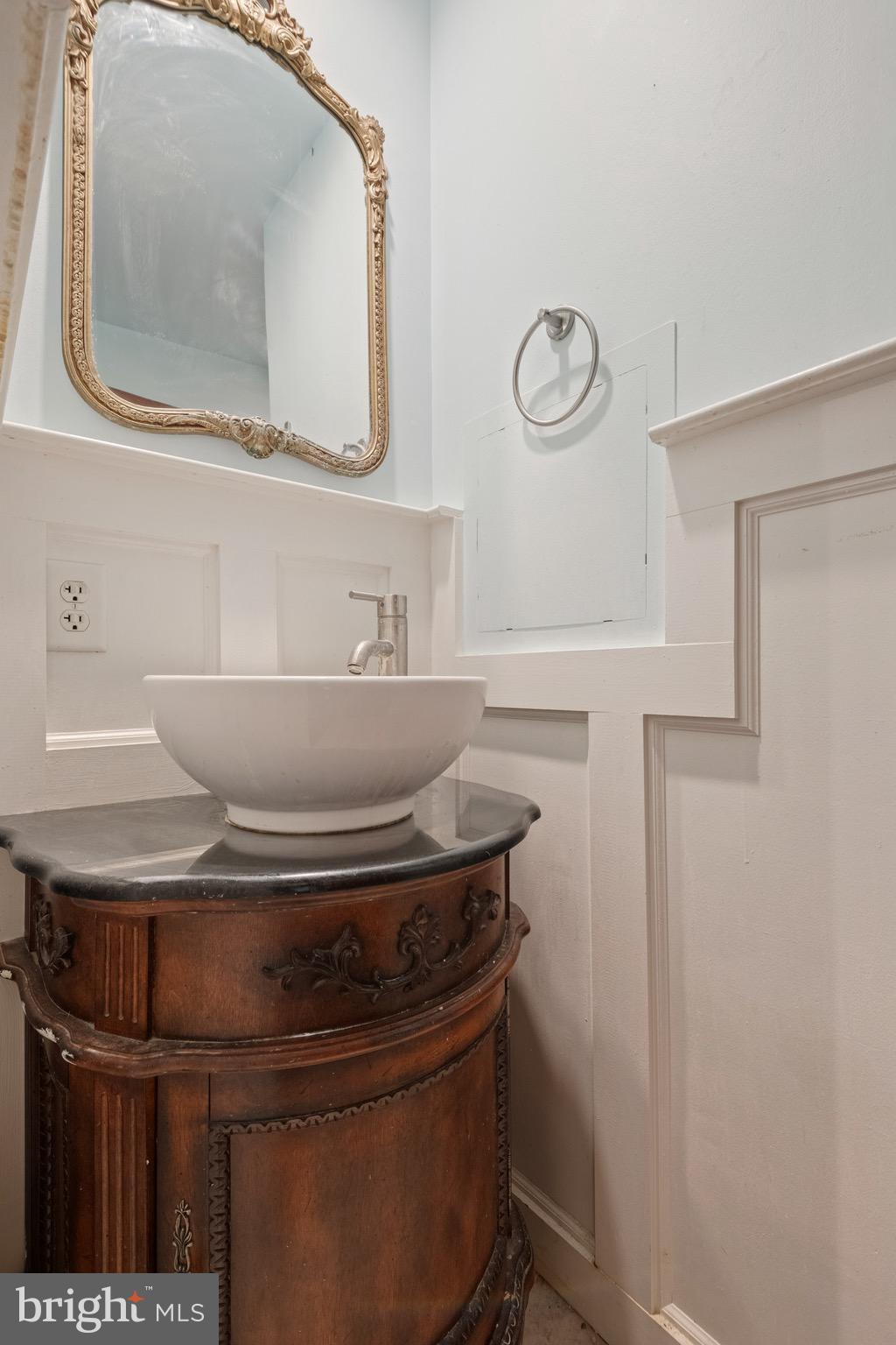 209 Ironstone Ridge Road Lancaster, PA 17603 - Photo 28 of 50 a bathroom with a sink and a mirror