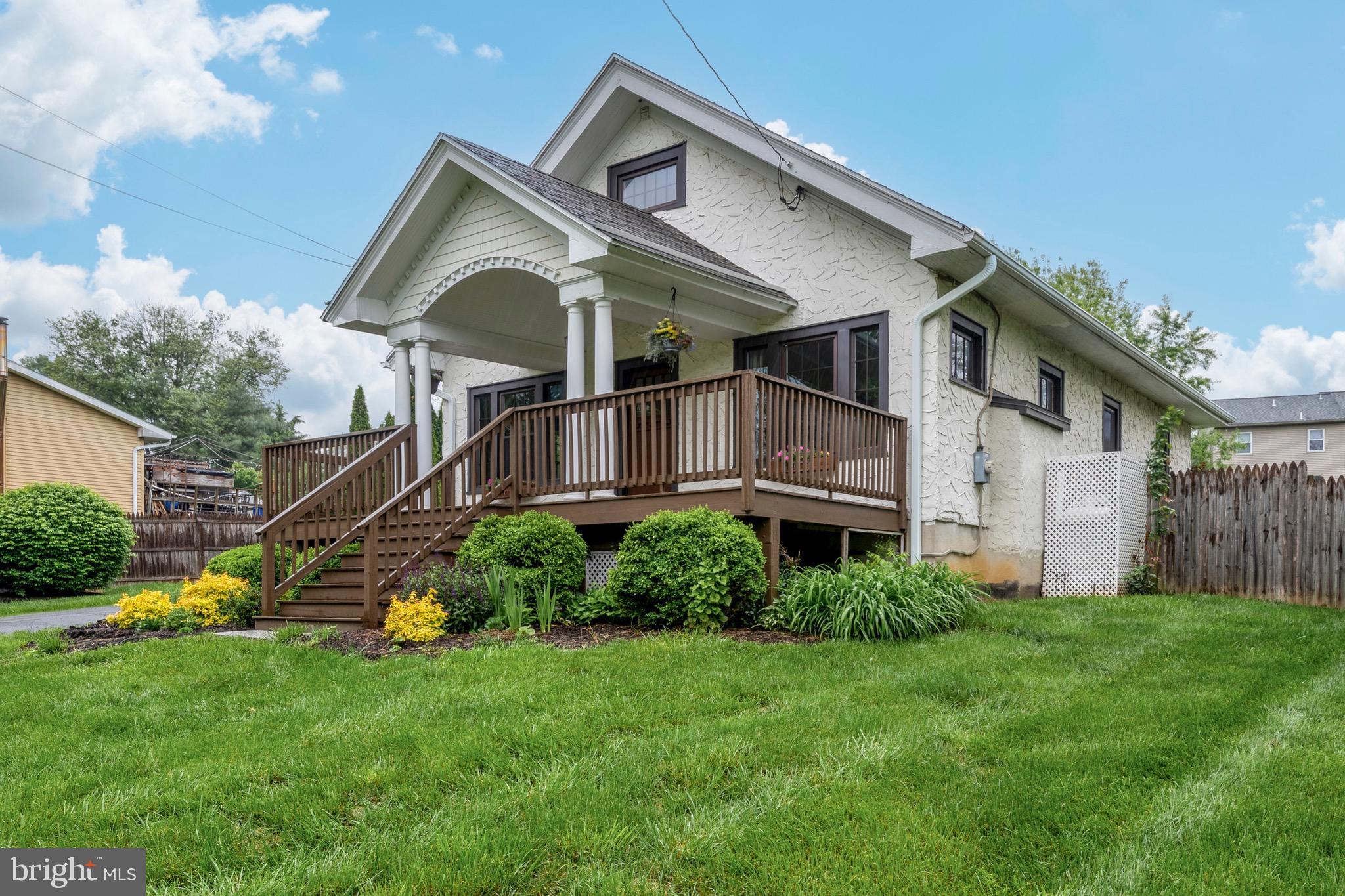 209 Ironstone Ridge Road Lancaster, PA 17603 - Photo 3 of 50 a front view of a house with a yard