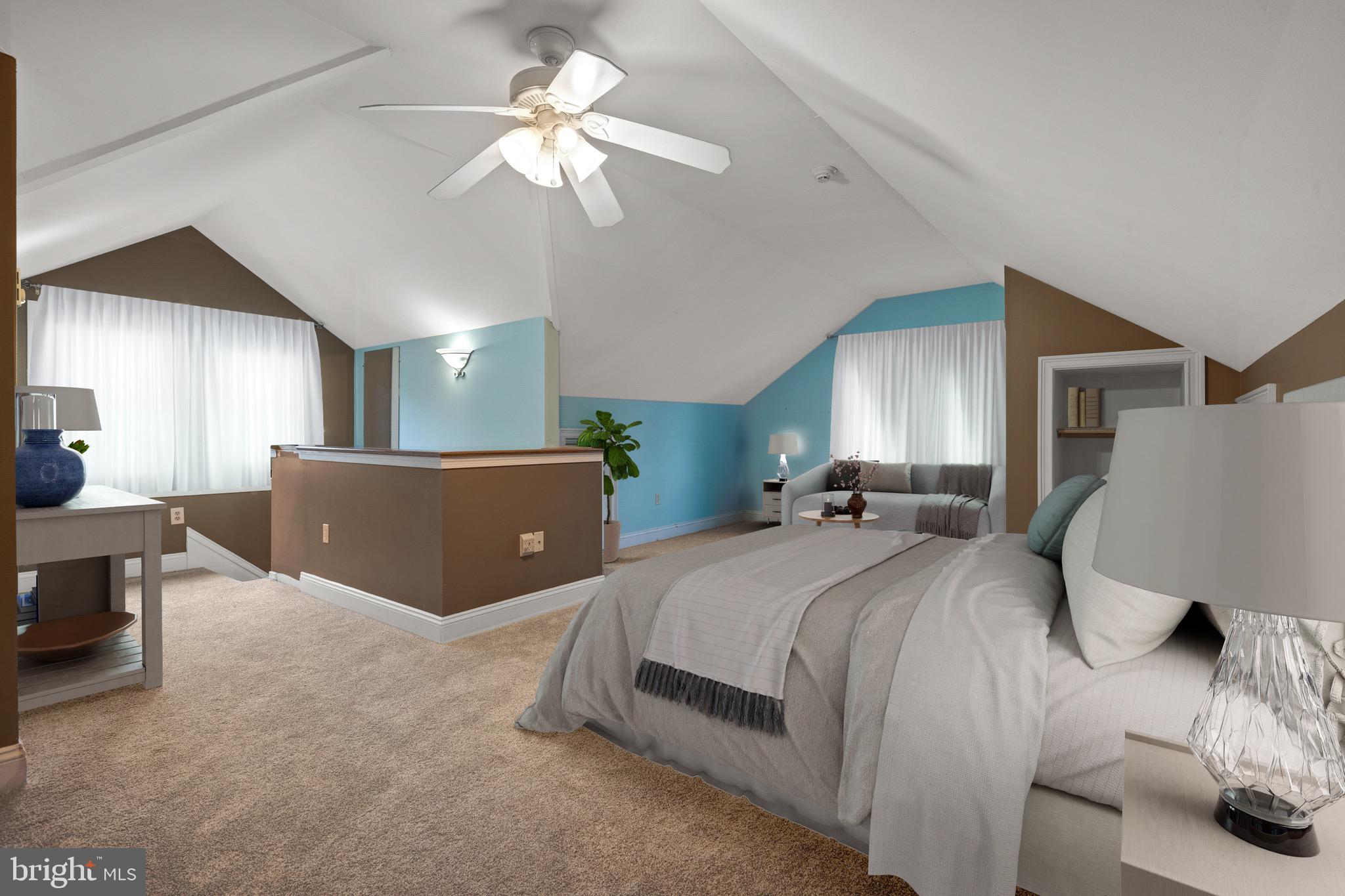 209 Ironstone Ridge Road Lancaster, PA 17603 - Photo 31 of 50 a spacious bedroom with a bed and a chandelier