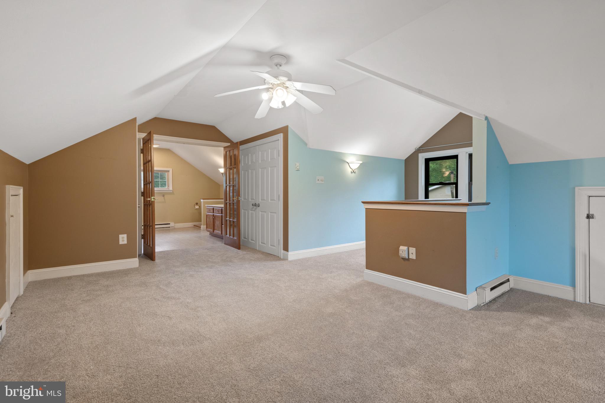 209 Ironstone Ridge Road Lancaster, PA 17603 - Photo 33 of 50 a view of an empty room with window and chandelier fan