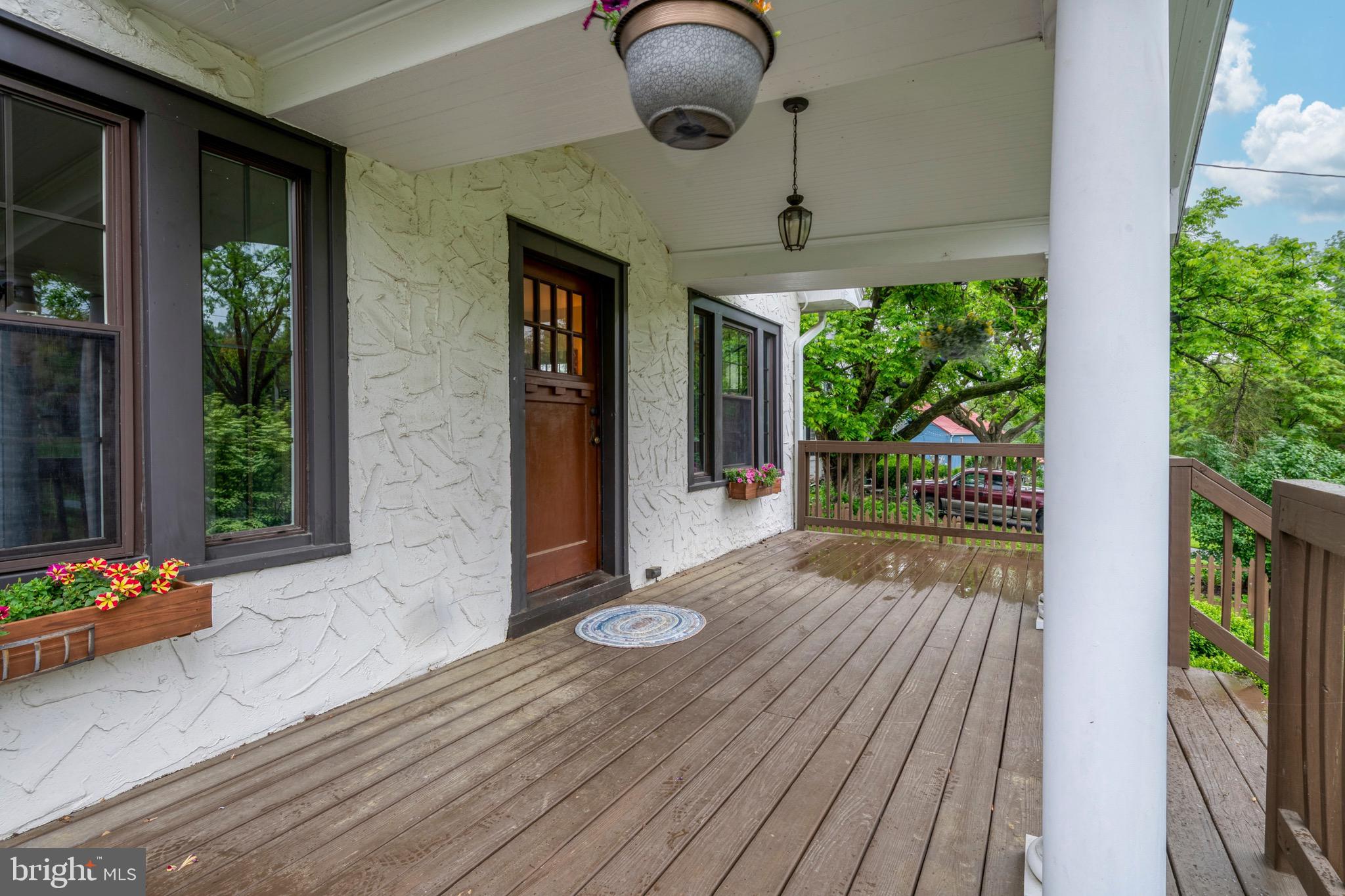 209 Ironstone Ridge Road Lancaster, PA 17603 - Photo 4 of 50 a view of a porch with wooden floor