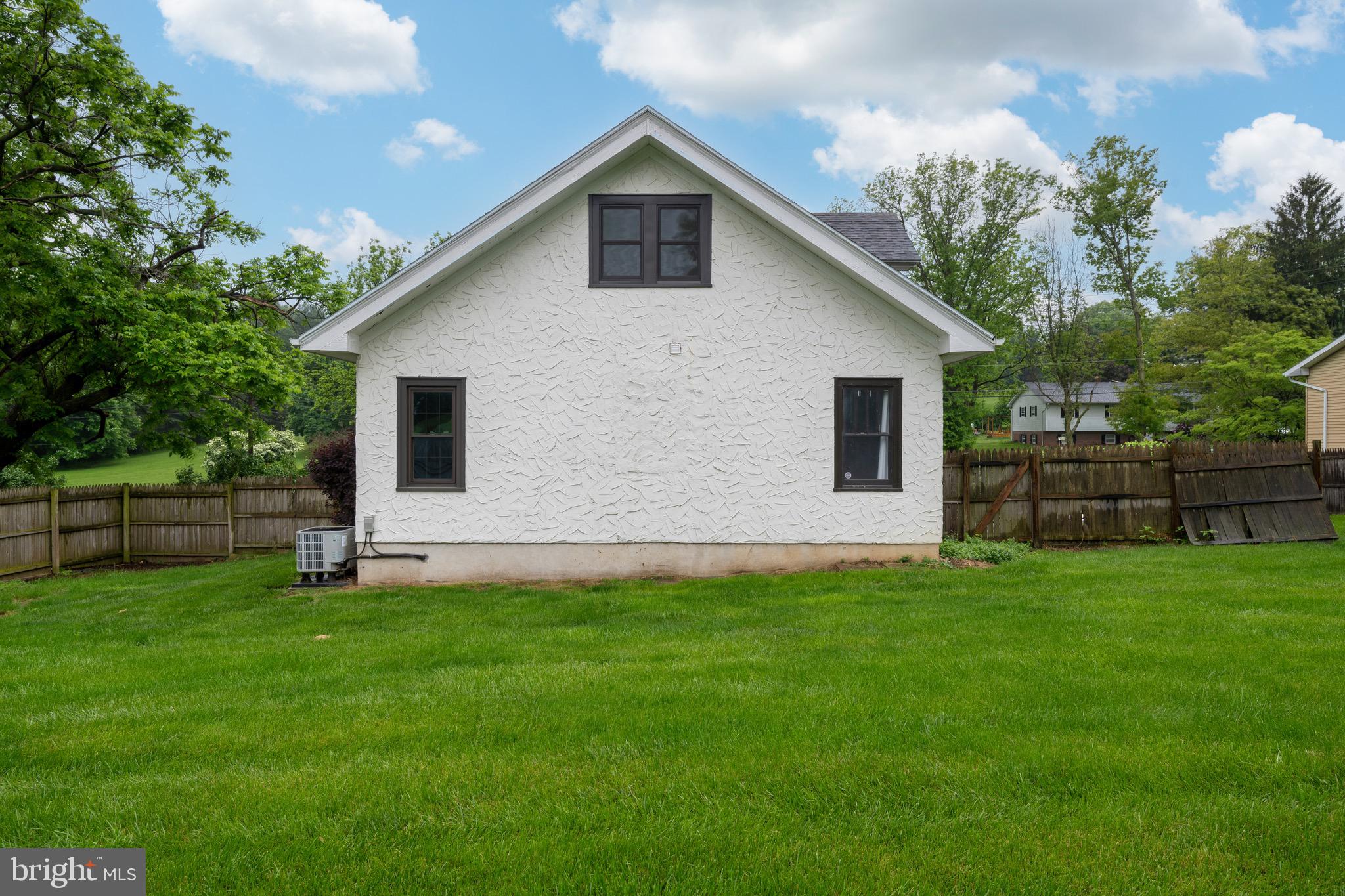 209 Ironstone Ridge Road Lancaster, PA 17603 - Photo 45 of 50 a view of a house with a yard