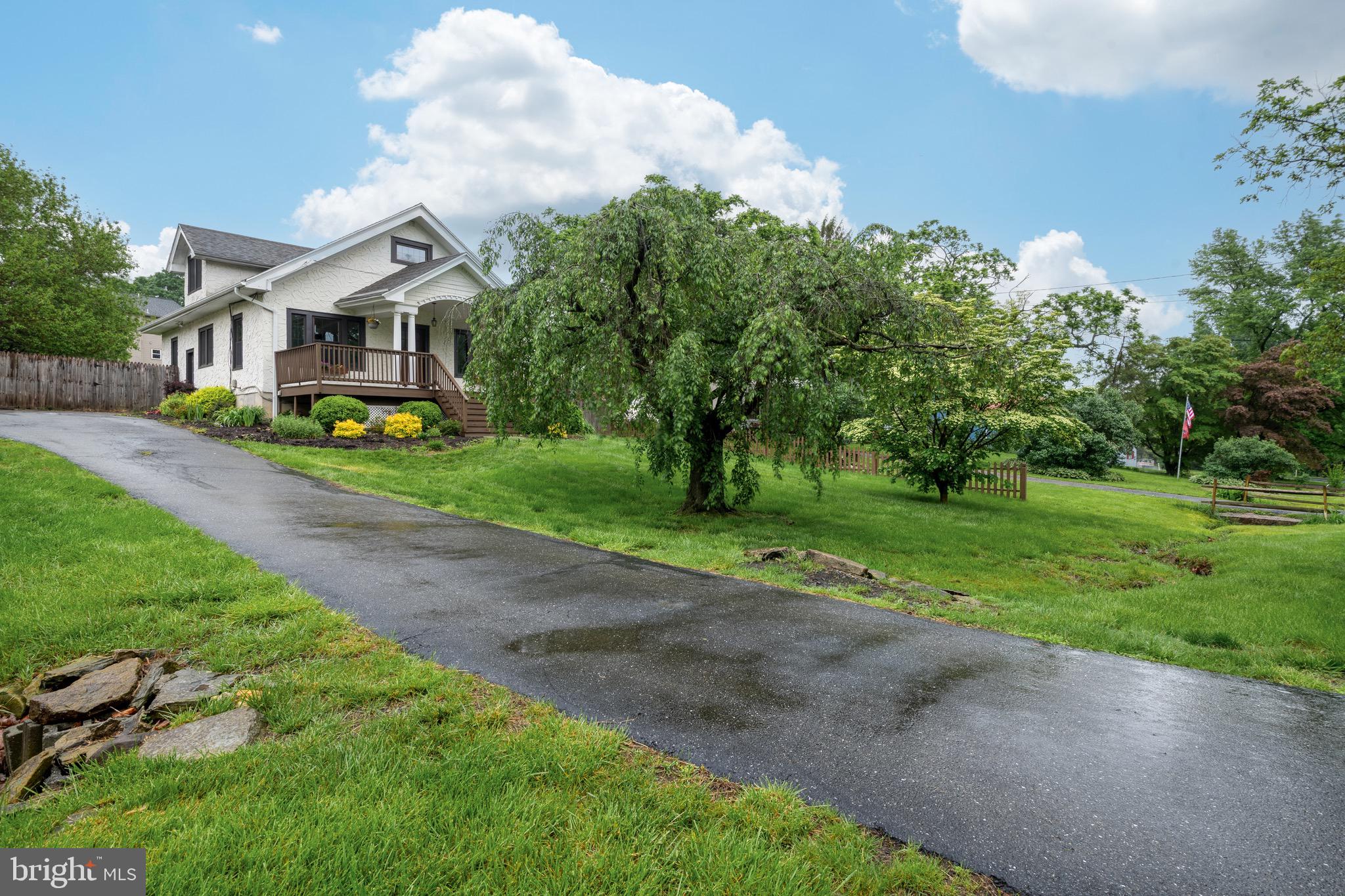 209 Ironstone Ridge Road Lancaster, PA 17603 - Photo 49 of 50 a front view of a house with garden
