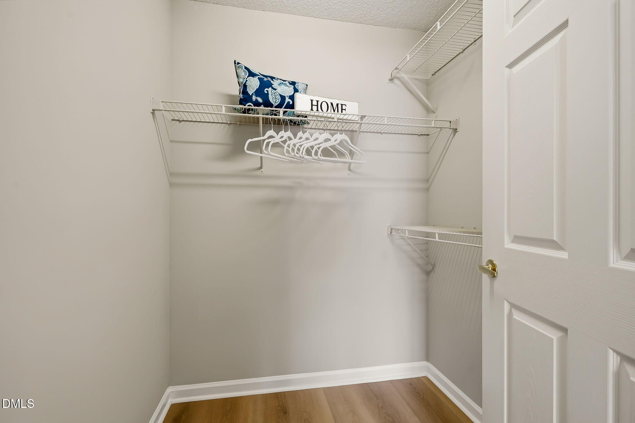 2501 Huntscroft Lane, Unit 100 Raleigh, NC 27617 - Photo 25 of 31 a view of walk in closet with clothes