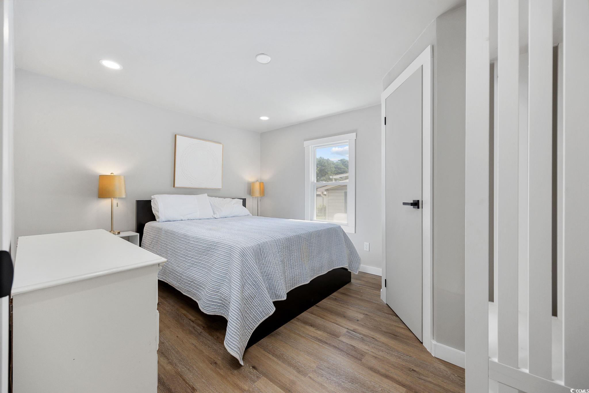 983 South Marlin Circle Murrells Inlet, SC 29576 - Photo 15 of 40 Bedroom with wood finished floors and recessed lighting