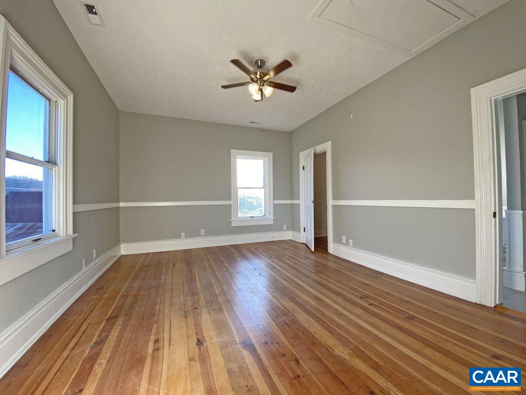 183 Summerdean Road Middlebrook, VA 24459 - Photo 19 of 36 wooden floor in an empty room with a window