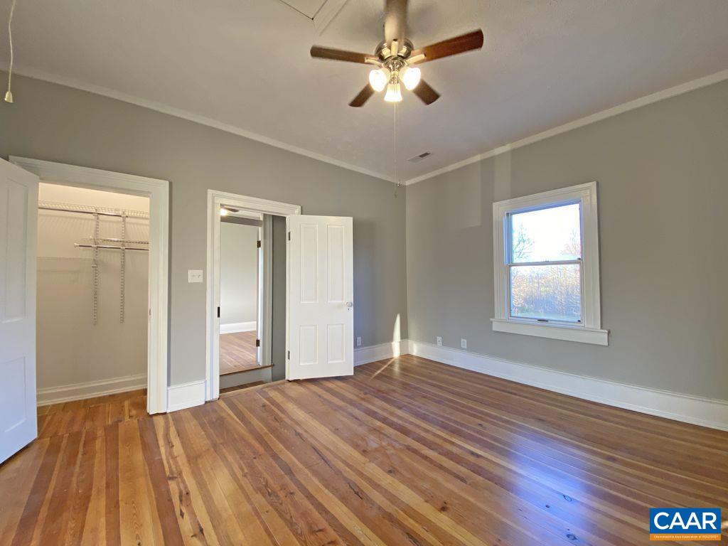 183 Summerdean Road Middlebrook, VA 24459 - Photo 25 of 36 a view of empty room with wooden floor and fan