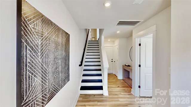 a view of entryway with wooden floor