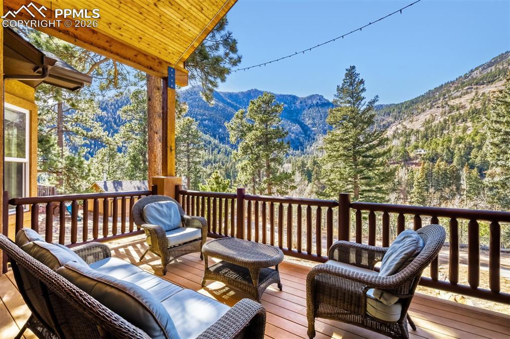 4519 Edwards Place Cascade, CO 80809 - Photo 11 of 47 Deck featuring a mountain views