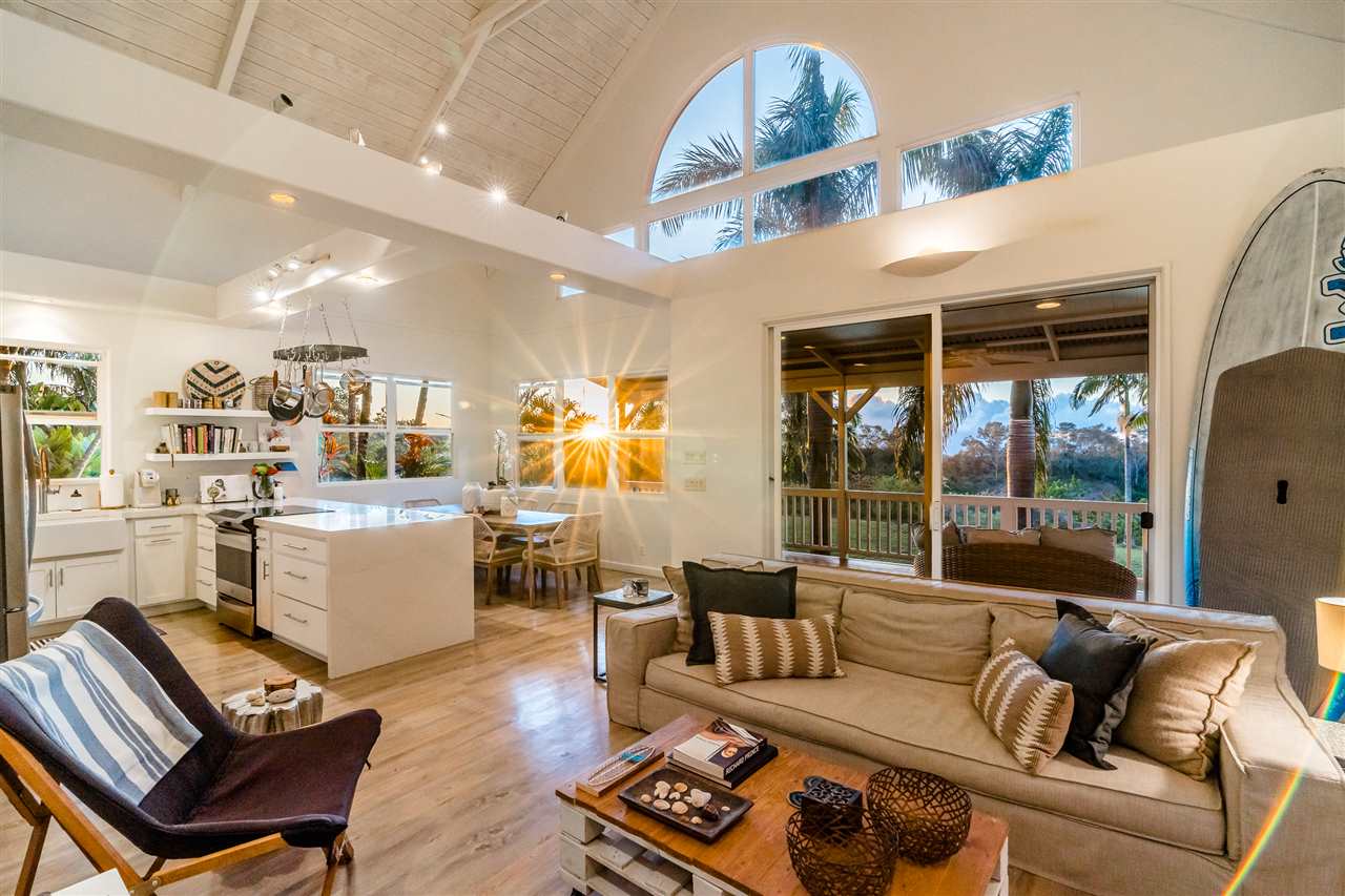 100 Laenani Street Haiku, HI 96708 - Photo 11 of 30 a living room with furniture and a large window