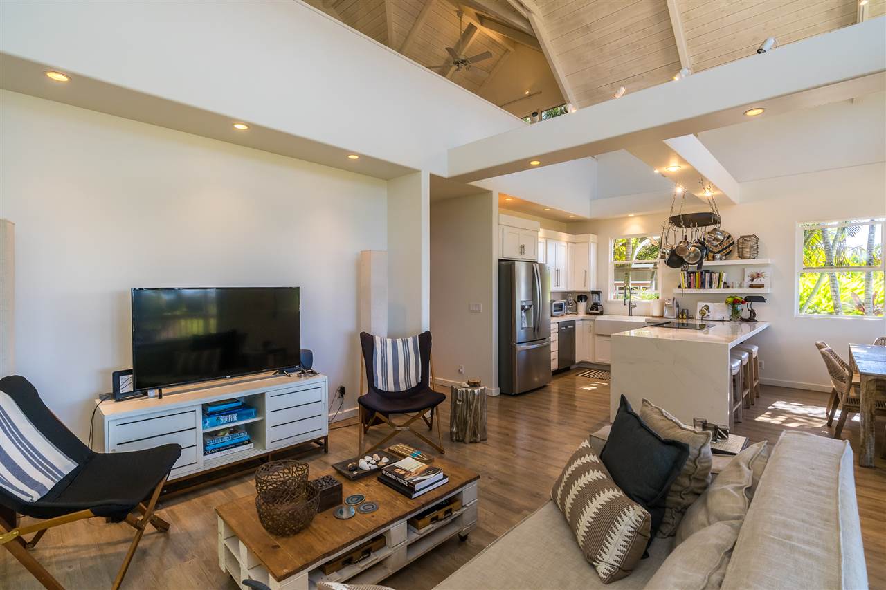 100 Laenani Street Haiku, HI 96708 - Photo 13 of 30 a living room with furniture and a flat screen tv