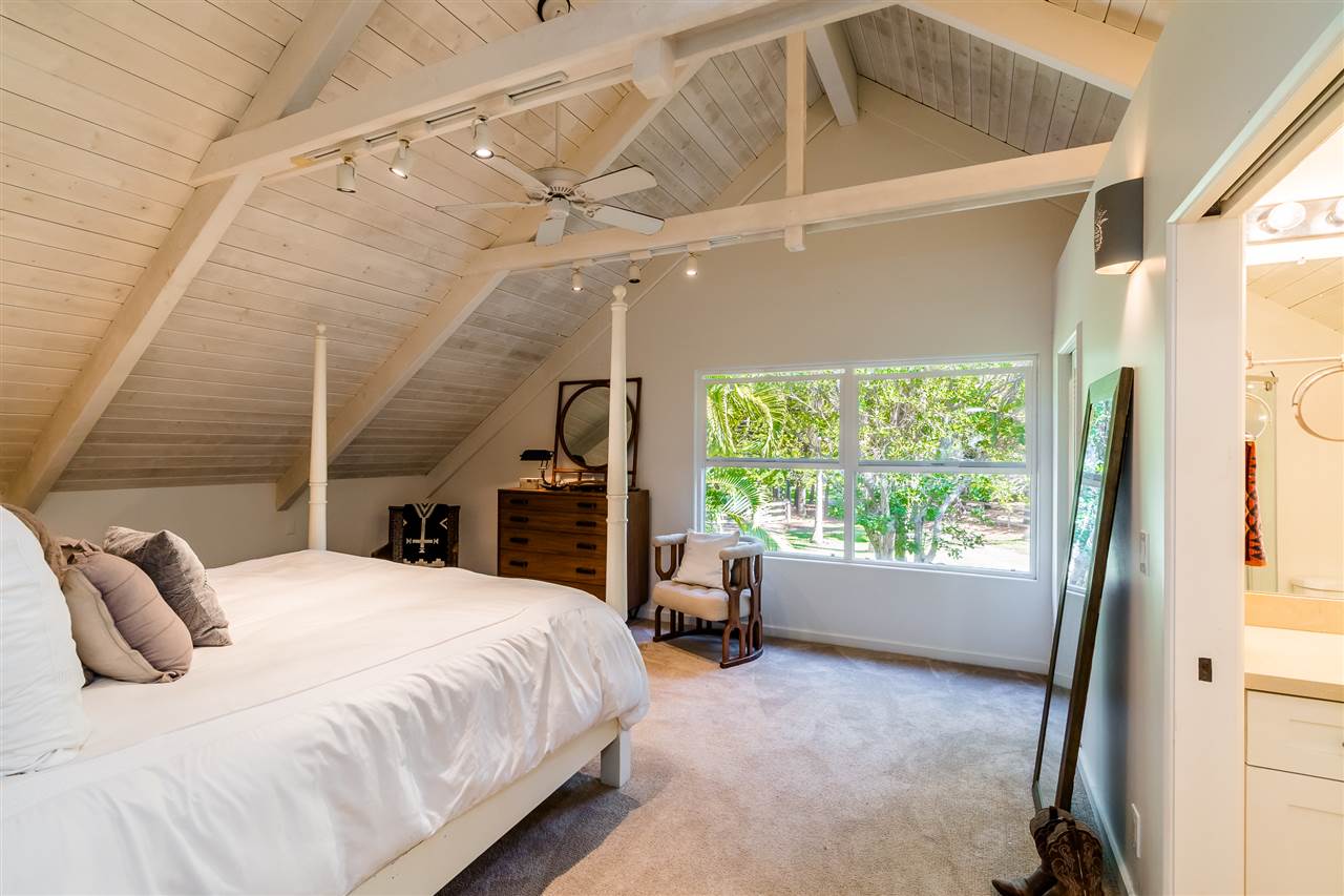 100 Laenani Street Haiku, HI 96708 - Photo 21 of 30 a bed room with a bed and a window