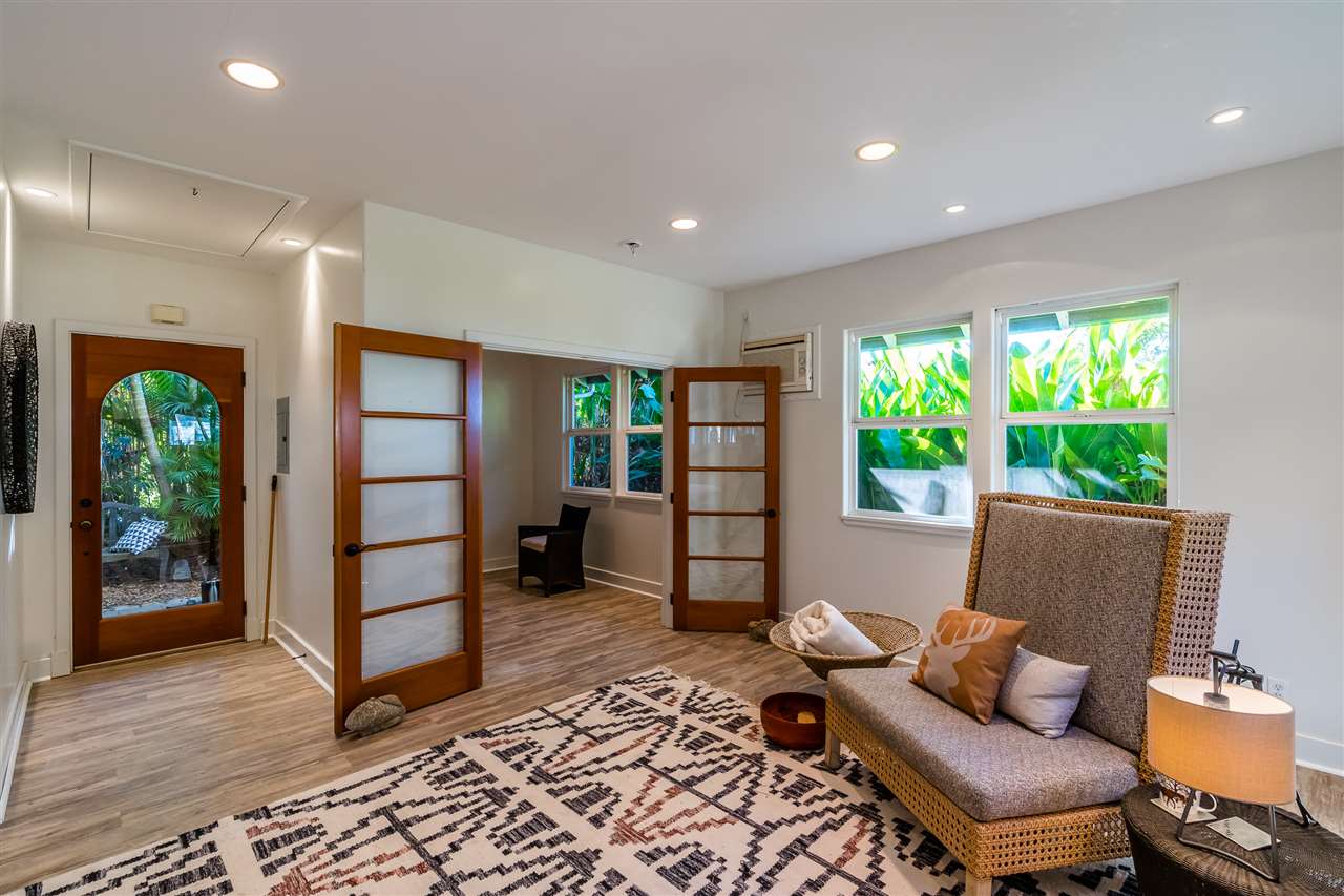 100 Laenani Street Haiku, HI 96708 - Photo 24 of 30 a living room with furniture and a window