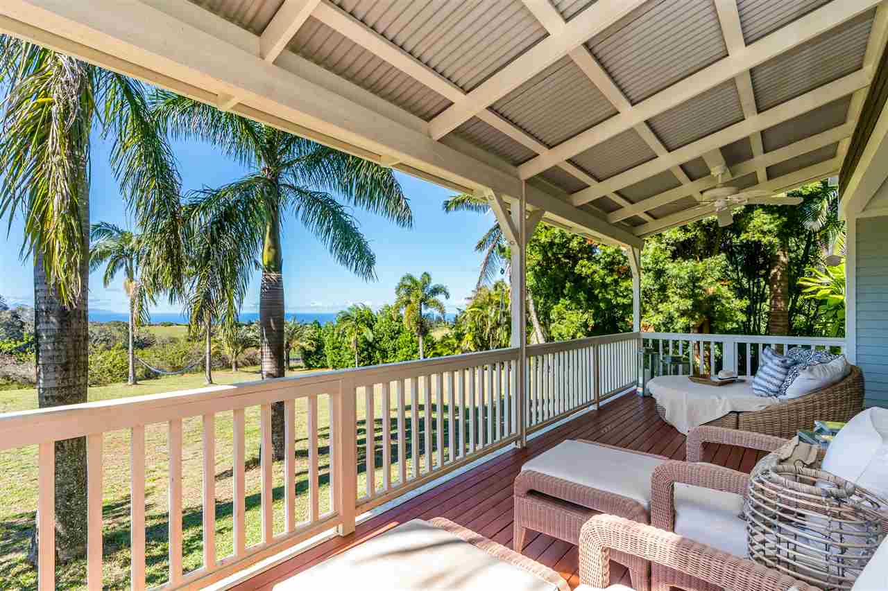 100 Laenani Street Haiku, HI 96708 - Photo 6 of 30 a view of a patio with wooden floor
