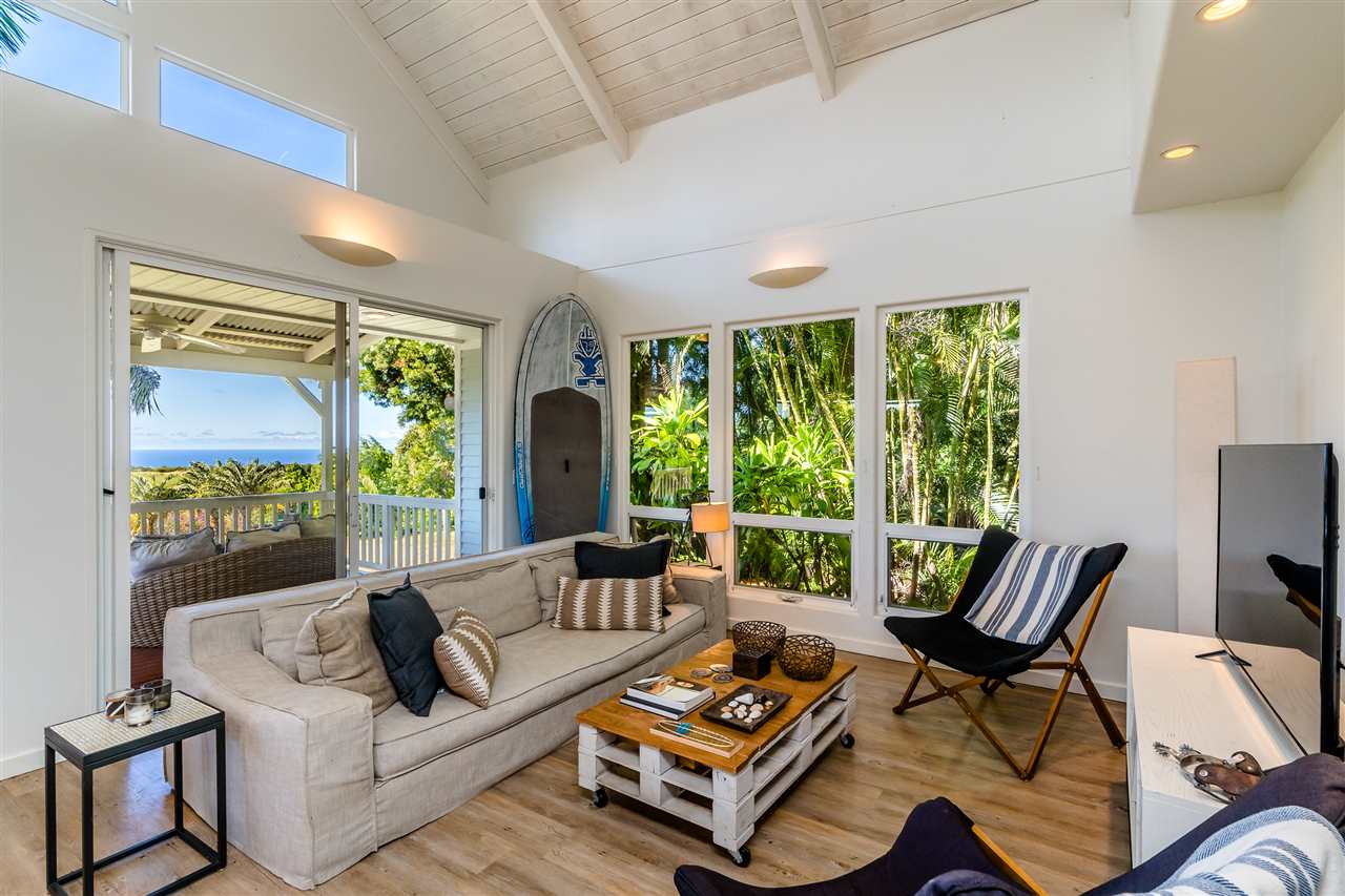 100 Laenani Street Haiku, HI 96708 - Photo 8 of 30 a living room with furniture and a large window