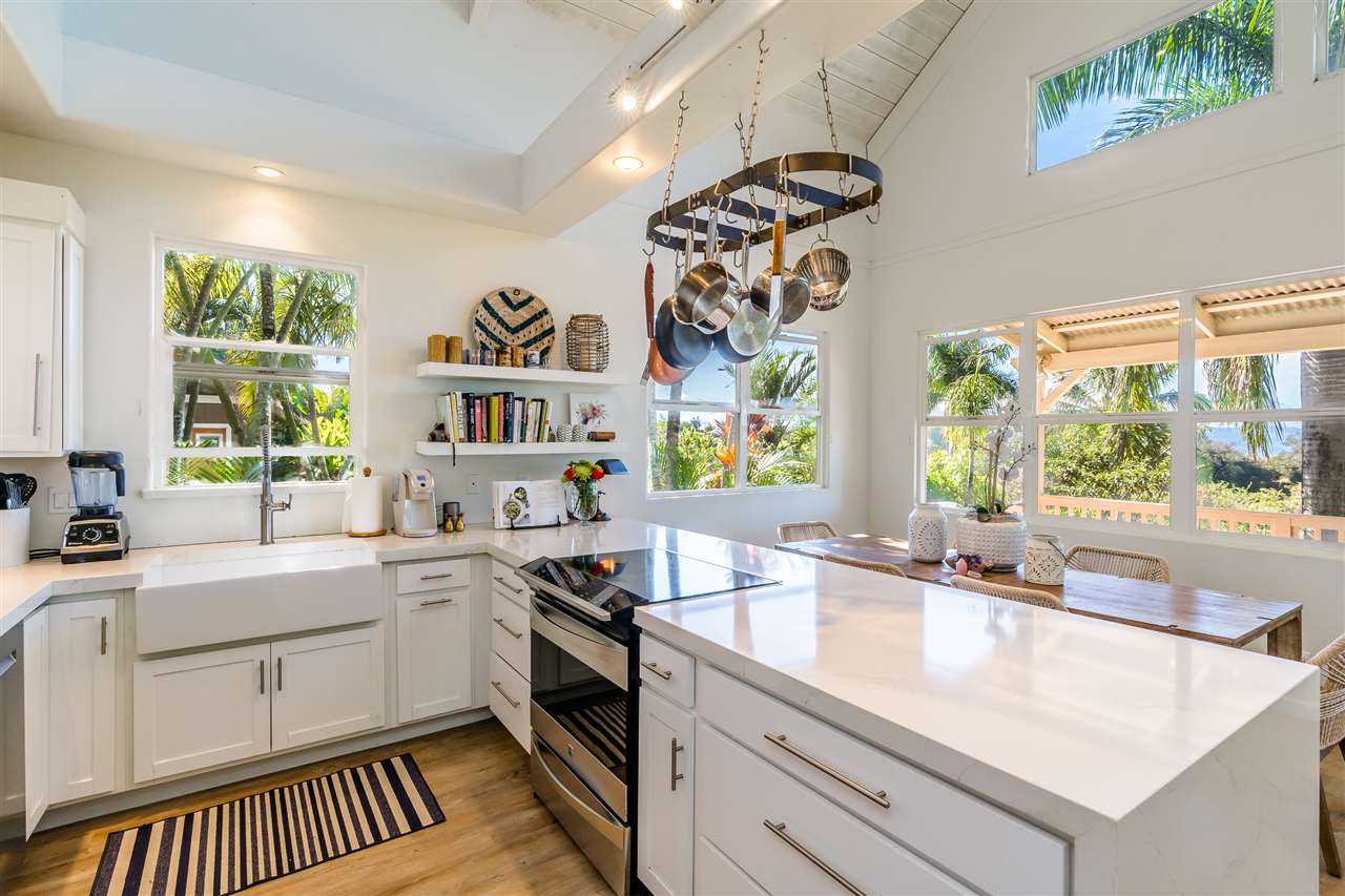 100 Laenani Street Haiku, HI 96708 - Photo 10 of 30 a kitchen that has a sink and a stove